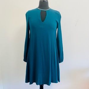 Black swan tunic with embellished collar